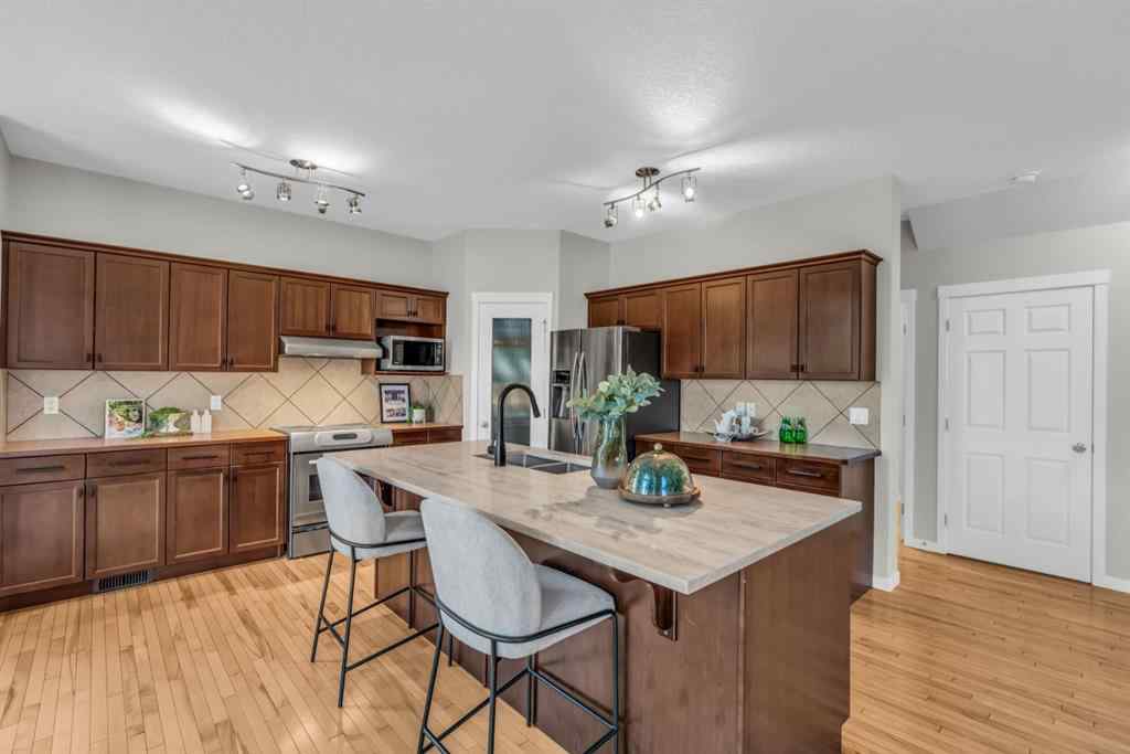 MLS® A2245382 - 16 Cougartown Close SW in Cougar Ridge Calgary, Residential