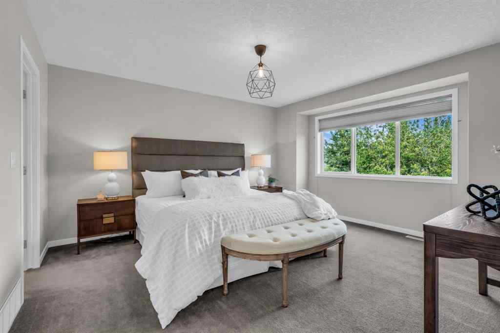 MLS® A2245382 - 16 Cougartown Close SW in Cougar Ridge Calgary, Residential