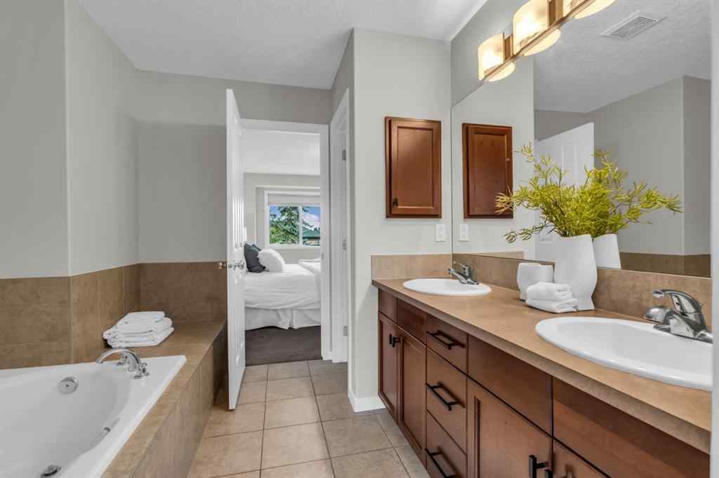MLS® A2245382 - 16 Cougartown Close SW in Cougar Ridge Calgary, Residential