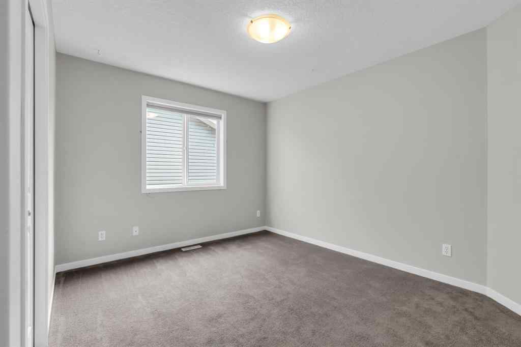MLS® A2245382 - 16 Cougartown Close SW in Cougar Ridge Calgary, Residential