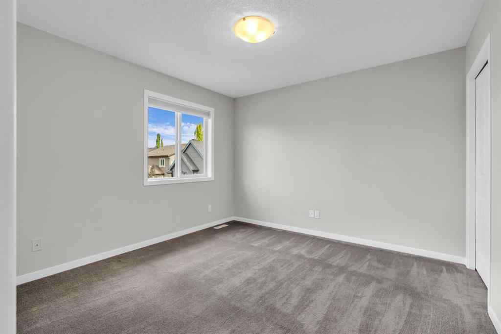 MLS® A2245382 - 16 Cougartown Close SW in Cougar Ridge Calgary, Residential