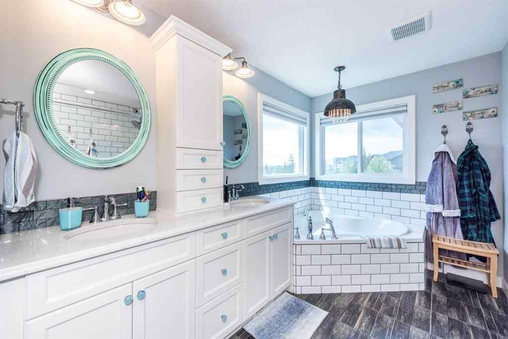 MLS® A2245383 - 103 Ravenskirk Road SE in Ravenswood Airdrie, Residential