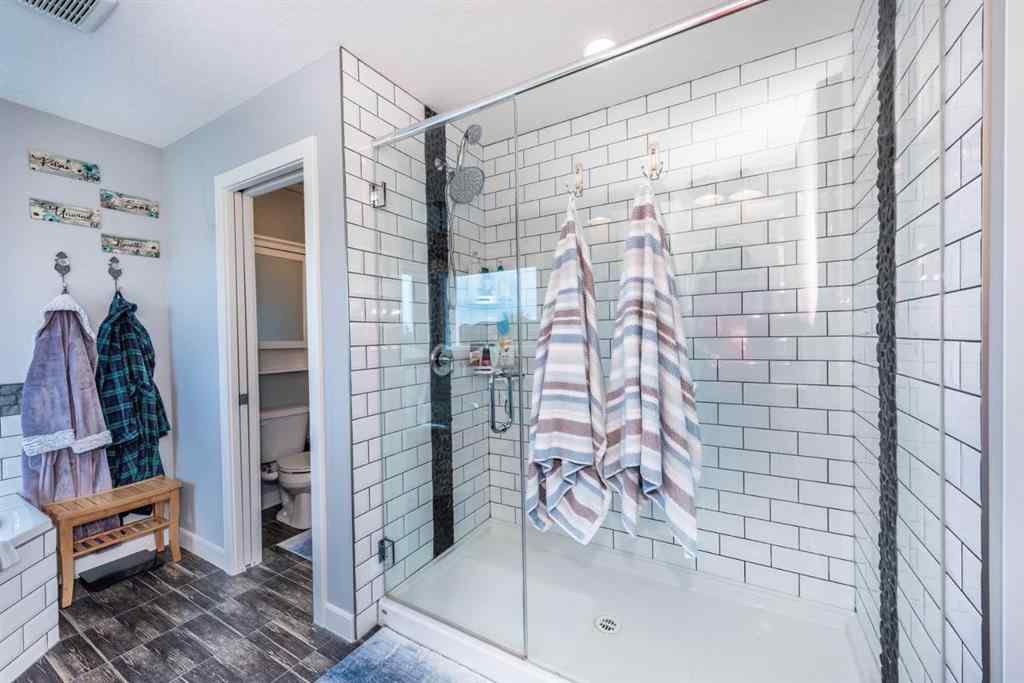 MLS® A2245383 - 103 Ravenskirk Road SE in Ravenswood Airdrie, Residential