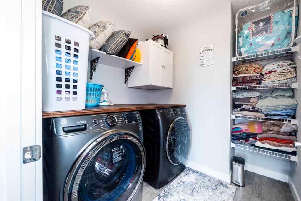 MLS® A2245383 - 103 Ravenskirk Road SE in Ravenswood Airdrie, Residential