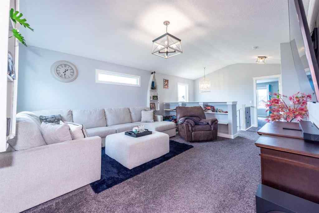 MLS® A2245383 - 103 Ravenskirk Road SE in Ravenswood Airdrie, Residential