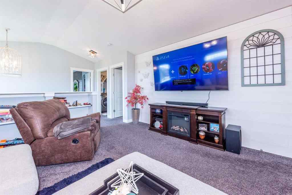 MLS® A2245383 - 103 Ravenskirk Road SE in Ravenswood Airdrie, Residential