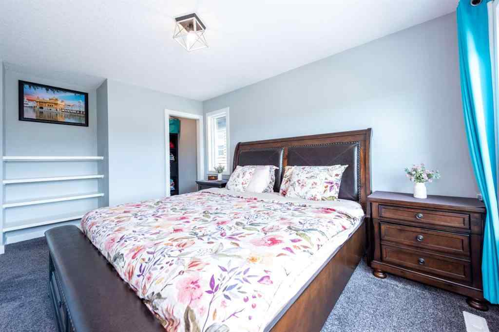 MLS® A2245383 - 103 Ravenskirk Road SE in Ravenswood Airdrie, Residential