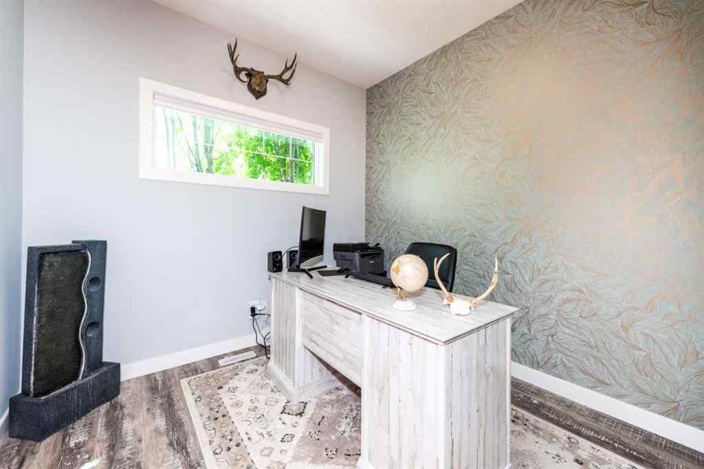 MLS® A2245383 - 103 Ravenskirk Road SE in Ravenswood Airdrie, Residential