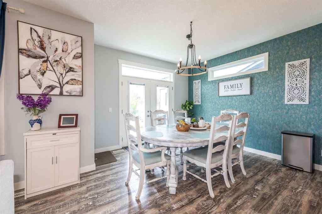 MLS® A2245383 - 103 Ravenskirk Road SE in Ravenswood Airdrie, Residential