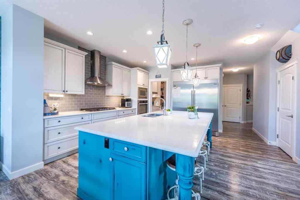 MLS® A2245383 - 103 Ravenskirk Road SE in Ravenswood Airdrie, Residential