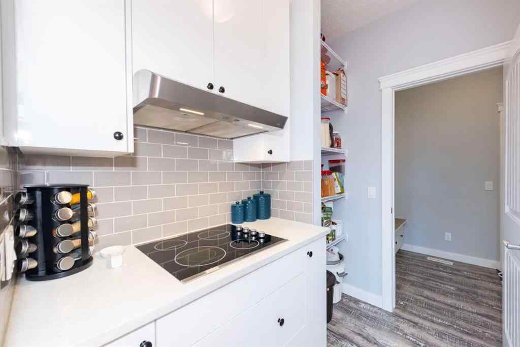 MLS® A2245383 - 103 Ravenskirk Road SE in Ravenswood Airdrie, Residential