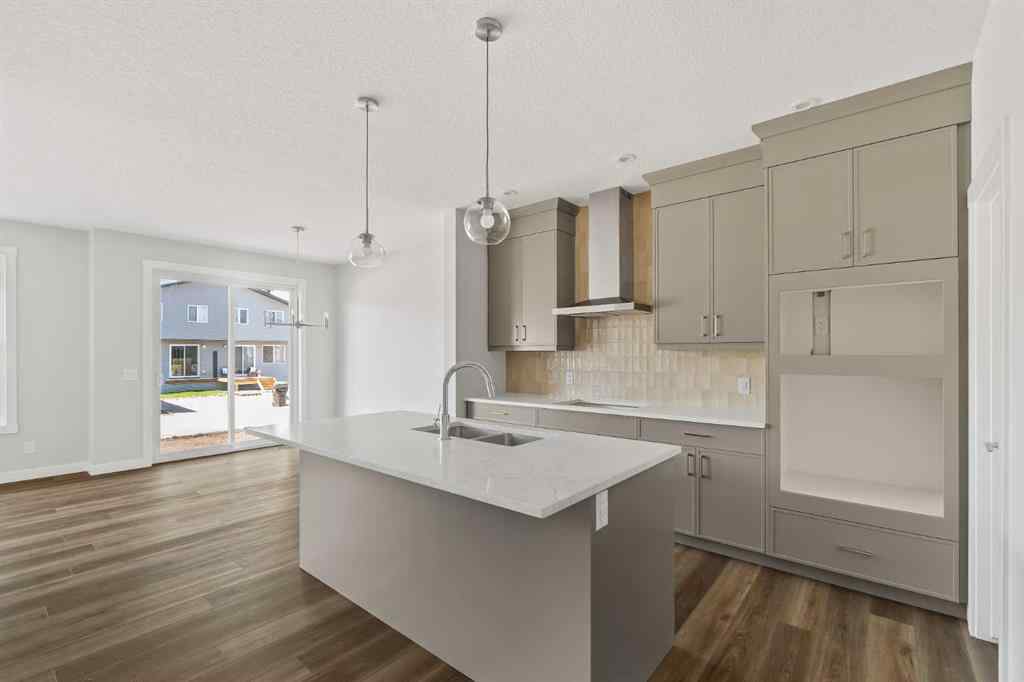 MLS® A2245391 - 144 Creekstone Circle SW in Pine Creek Calgary, Residential