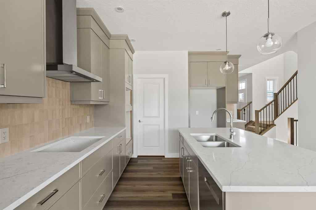 MLS® A2245391 - 144 Creekstone Circle SW in Pine Creek Calgary, Residential