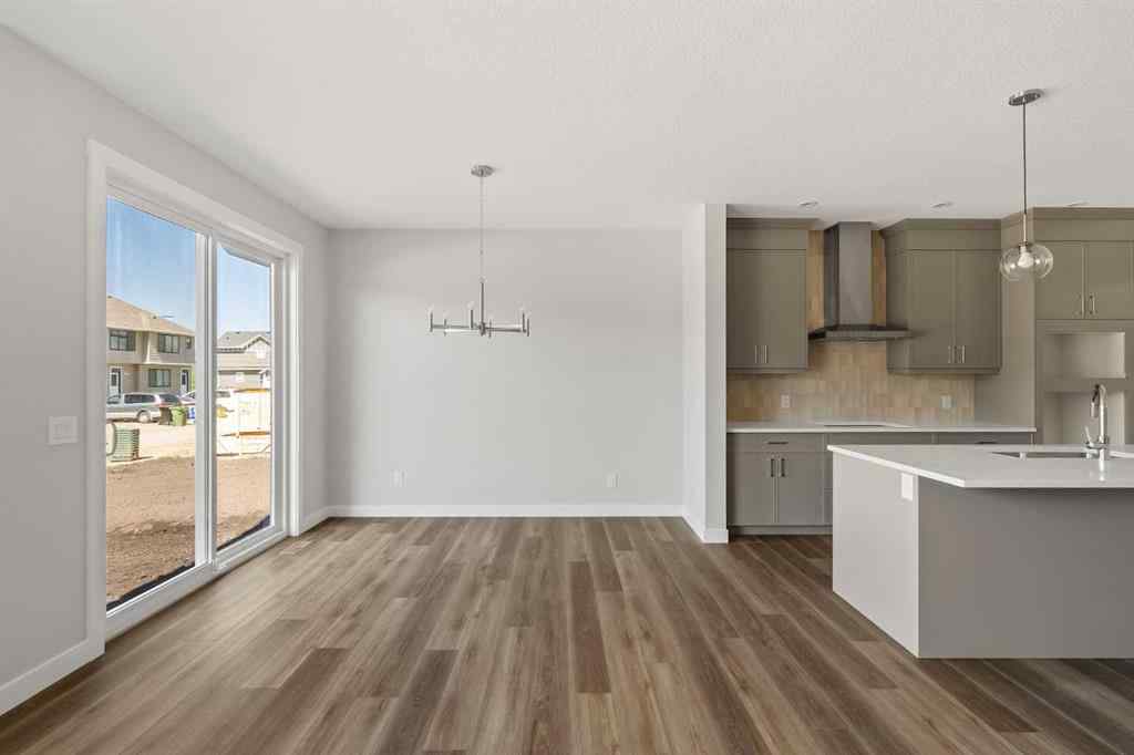 MLS® A2245391 - 144 Creekstone Circle SW in Pine Creek Calgary, Residential