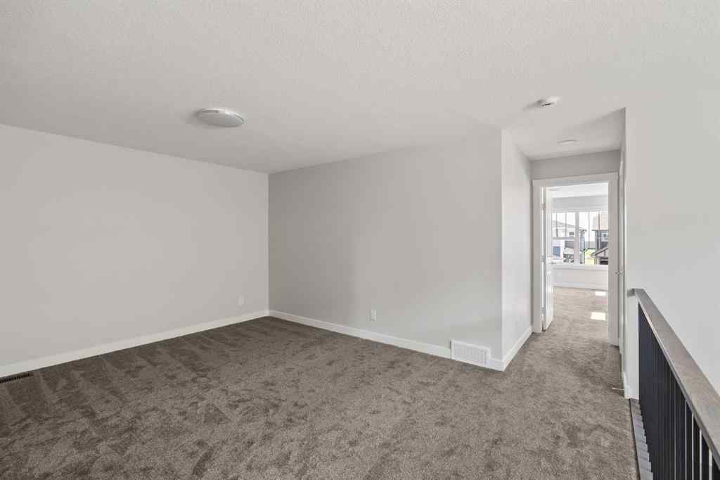 MLS® A2245391 - 144 Creekstone Circle SW in Pine Creek Calgary, Residential