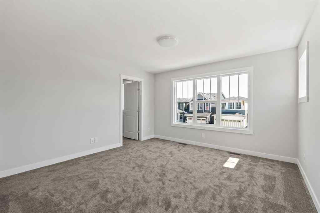 MLS® A2245391 - 144 Creekstone Circle SW in Pine Creek Calgary, Residential