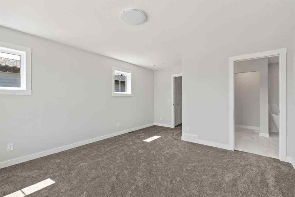 MLS® A2245391 - 144 Creekstone Circle SW in Pine Creek Calgary, Residential