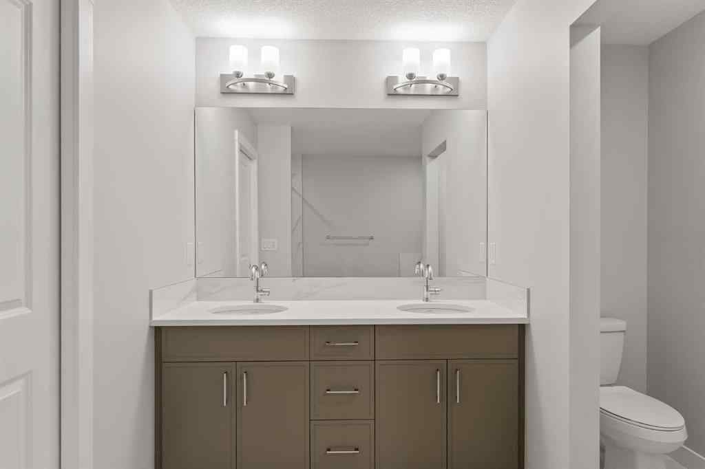 MLS® A2245391 - 144 Creekstone Circle SW in Pine Creek Calgary, Residential