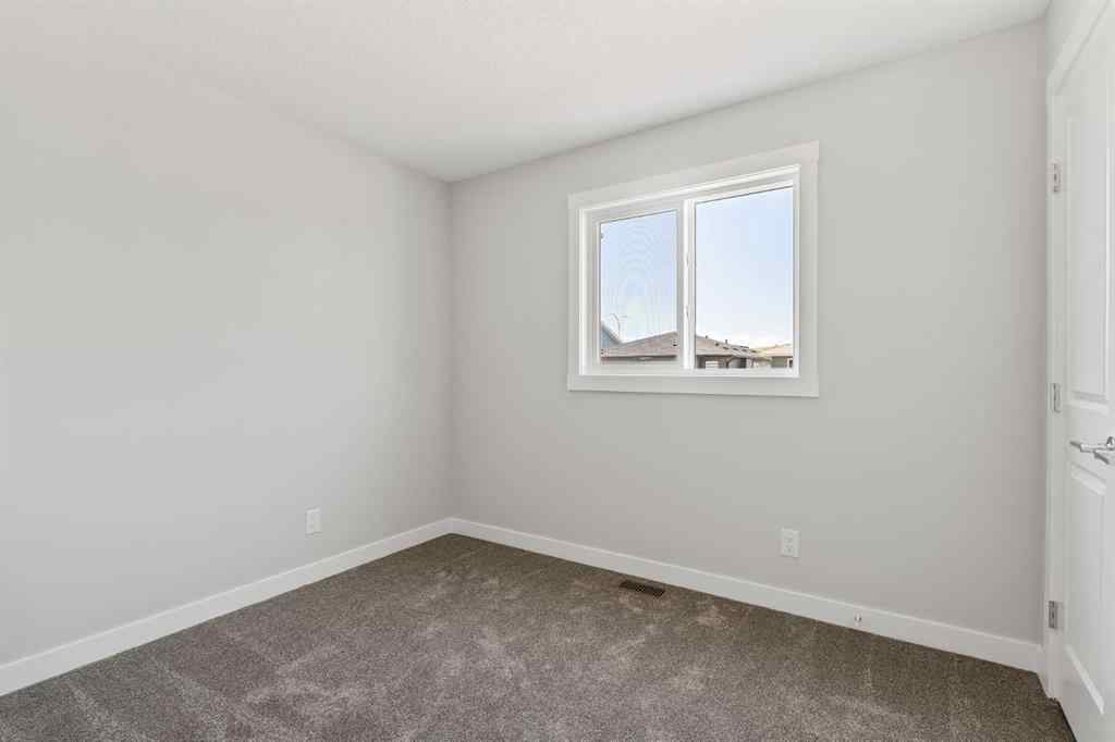 MLS® A2245391 - 144 Creekstone Circle SW in Pine Creek Calgary, Residential