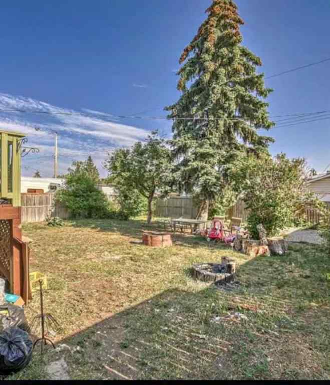 MLS® A2245402 - 319 Manora Drive NE in Marlborough Park Calgary, Residential