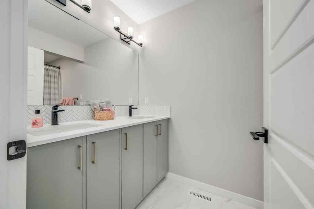 MLS® A2245420 - 20 Magnolia Bay SE in Mahogany Calgary, Residential