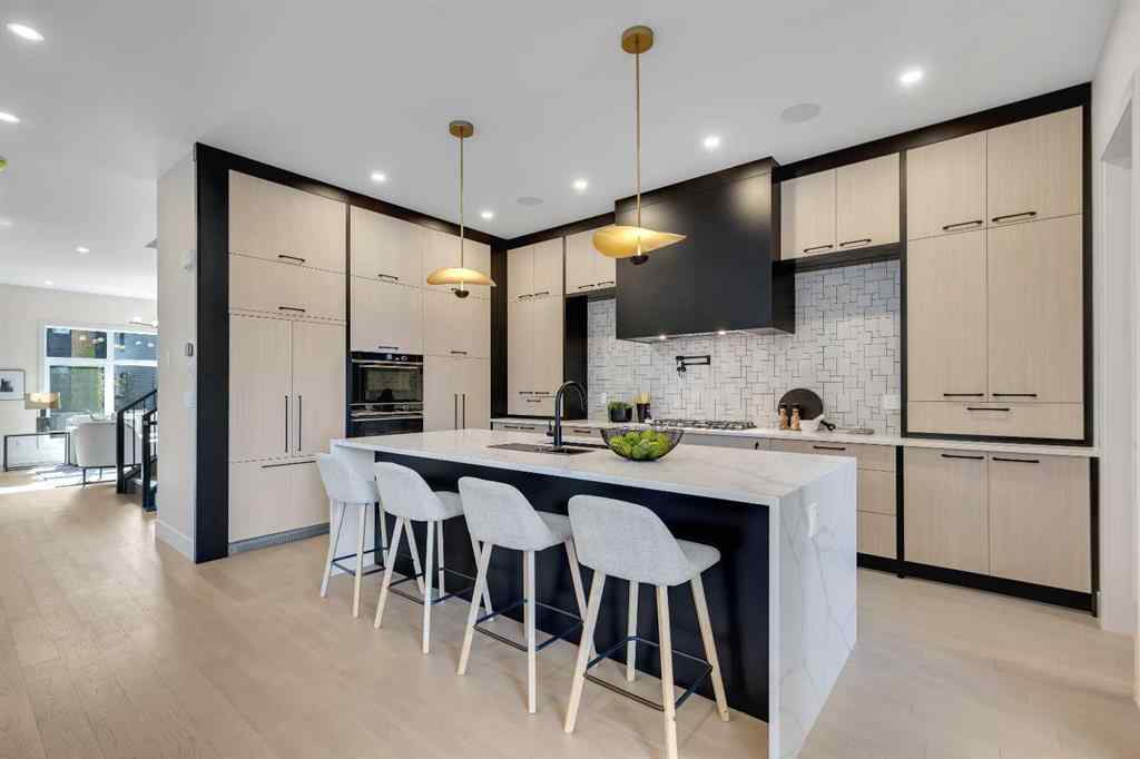 MLS® A2245451 - 336 Normandy Drive SW in Currie Barracks Calgary, Residential