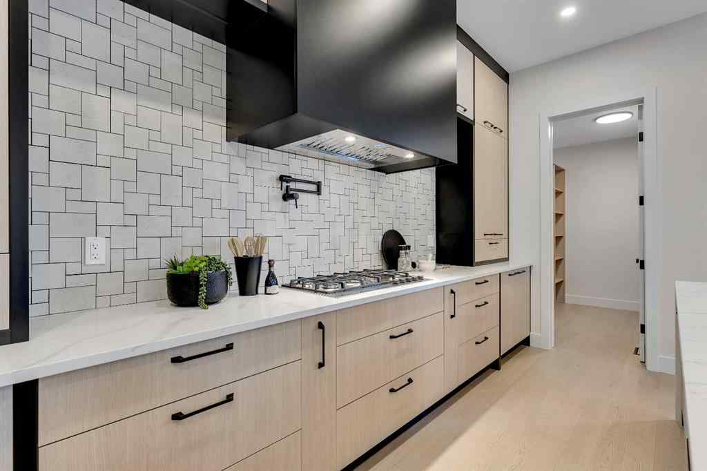 MLS® A2245451 - 336 Normandy Drive SW in Currie Barracks Calgary, Residential
