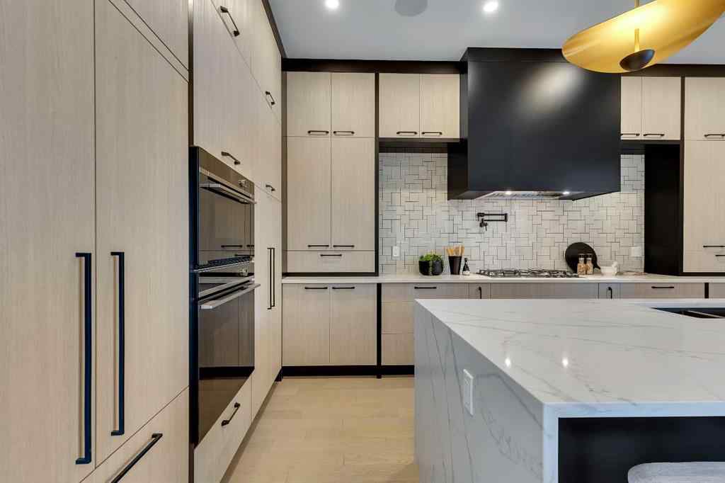 MLS® A2245451 - 336 Normandy Drive SW in Currie Barracks Calgary, Residential