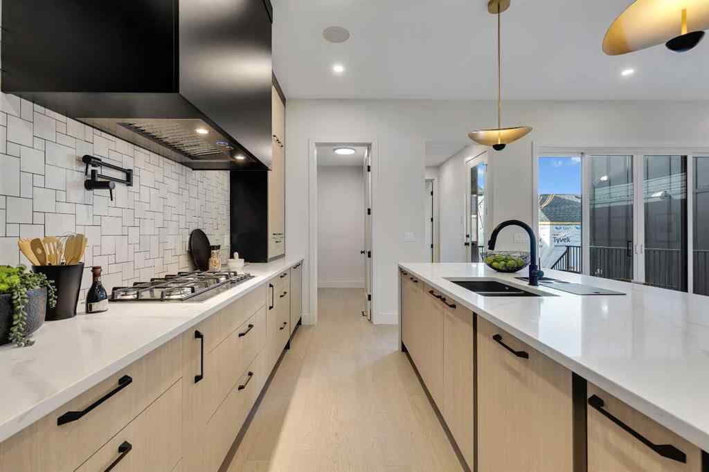 MLS® A2245451 - 336 Normandy Drive SW in Currie Barracks Calgary, Residential