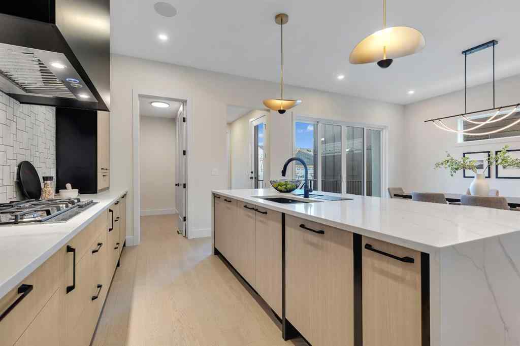 MLS® A2245451 - 336 Normandy Drive SW in Currie Barracks Calgary, Residential