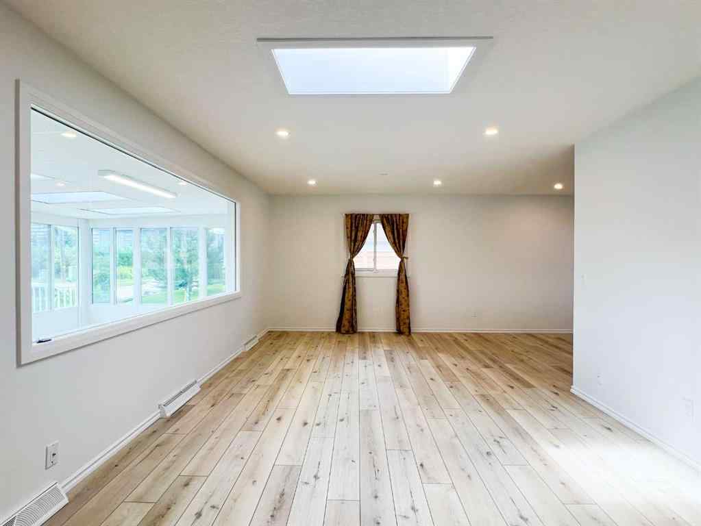 MLS® A2245468 - 85 Malibou Road SW in Meadowlark Park Calgary, Residential