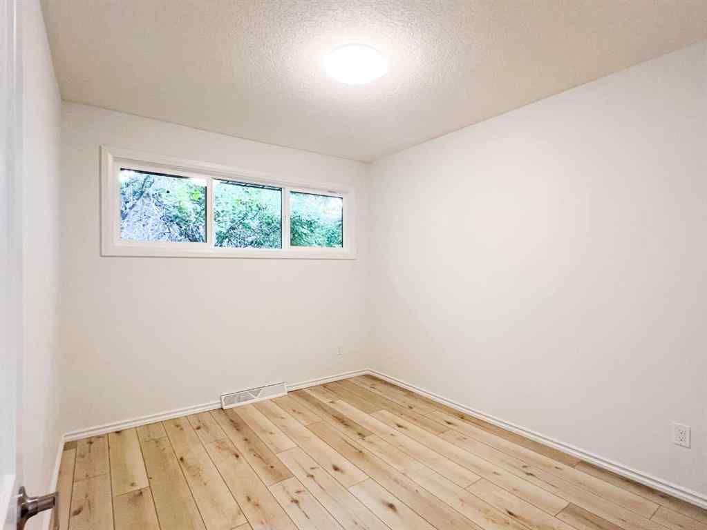 MLS® A2245468 - 85 Malibou Road SW in Meadowlark Park Calgary, Residential