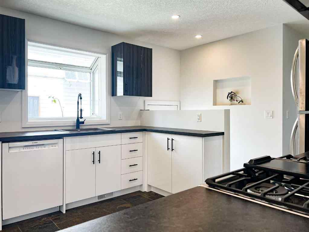 MLS® A2245468 - 85 Malibou Road SW in Meadowlark Park Calgary, Residential