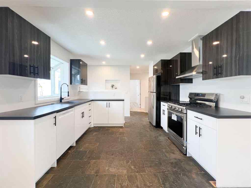 MLS® A2245468 - 85 Malibou Road SW in Meadowlark Park Calgary, Residential