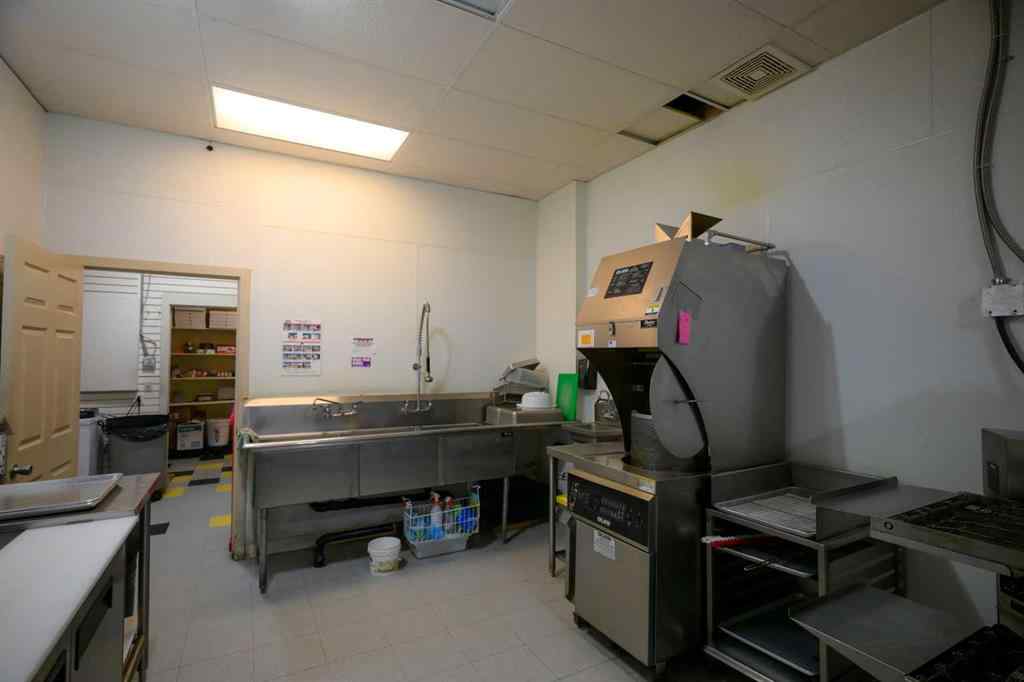 MLS® A2245485 - 123 Any Street   in Downtown Cochrane, Commercial