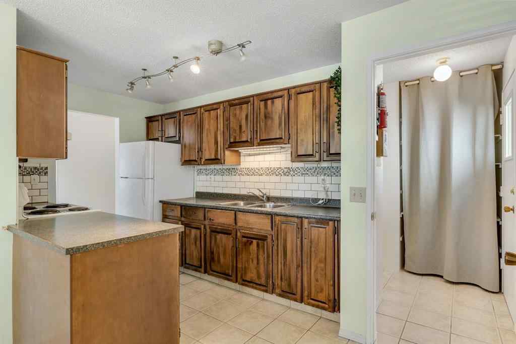 MLS® A2245505 - 127 Falshire Way NE in Falconridge Calgary, Residential