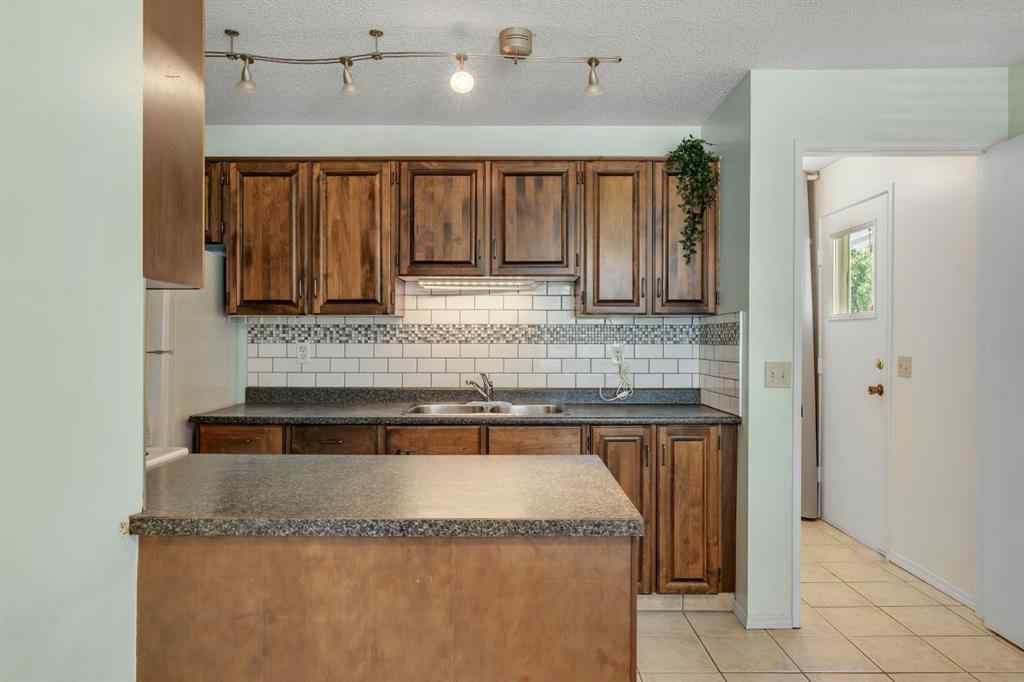MLS® A2245505 - 127 Falshire Way NE in Falconridge Calgary, Residential