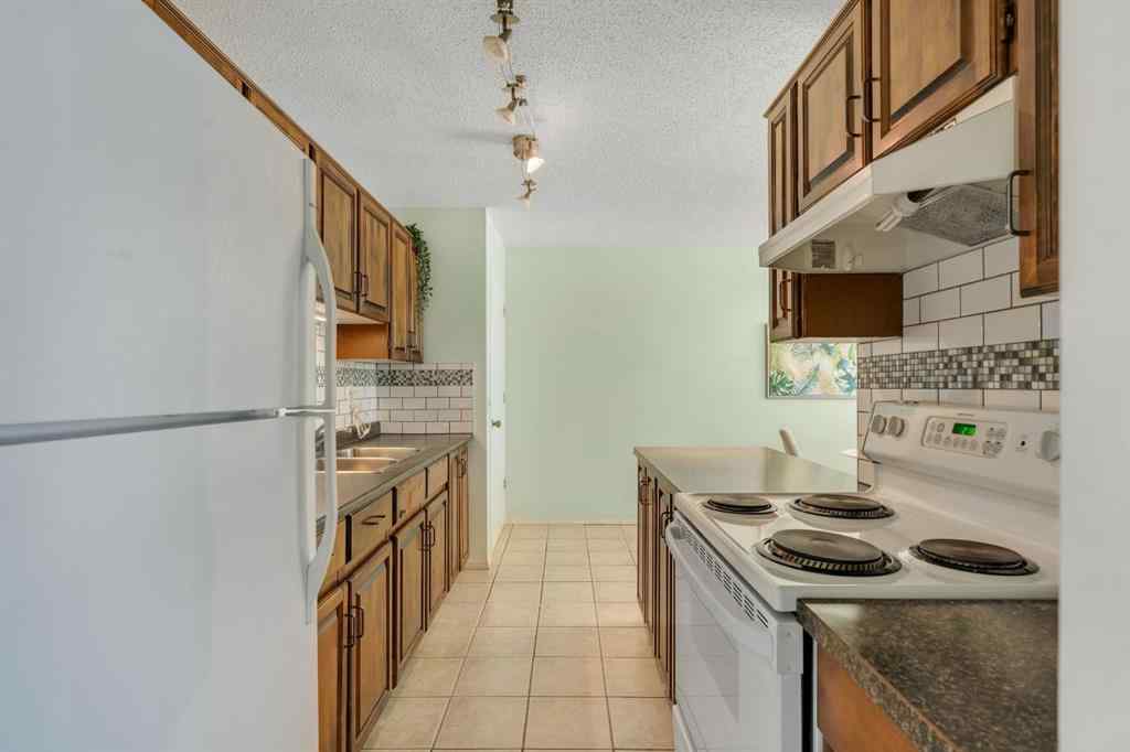 MLS® A2245505 - 127 Falshire Way NE in Falconridge Calgary, Residential