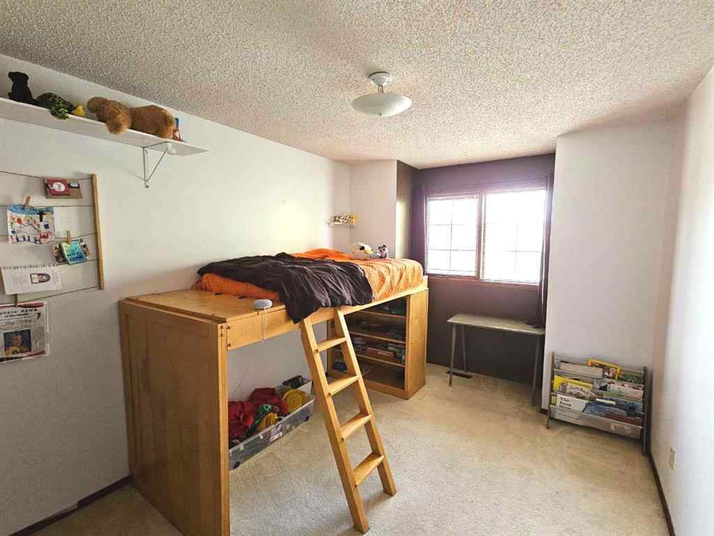 MLS® A2245539 - 125 Sherwood Place W in Ridgewood Lethbridge, Residential