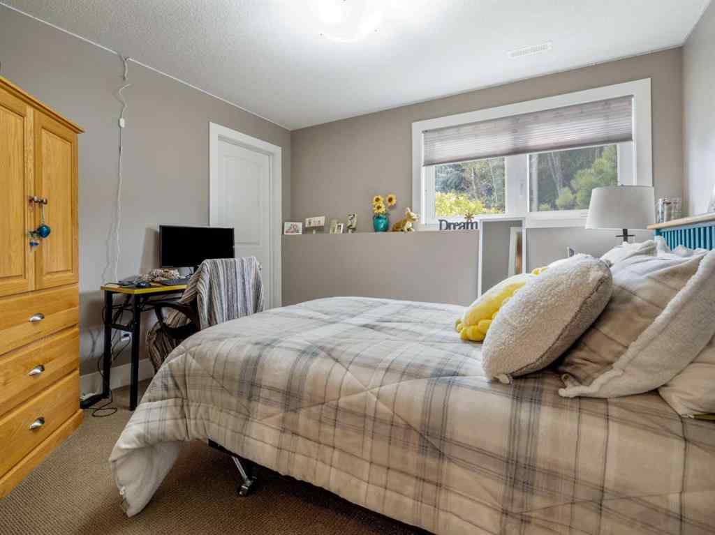 MLS® A2245550 - 53 Sandstone Road S in Southridge Lethbridge, Residential