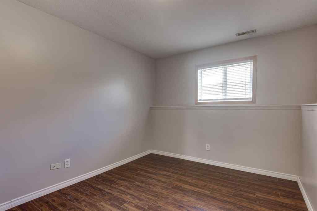 MLS® A2245580 - Unit #A 5915 52 Avenue  in Riverside Meadows Red Deer, Residential