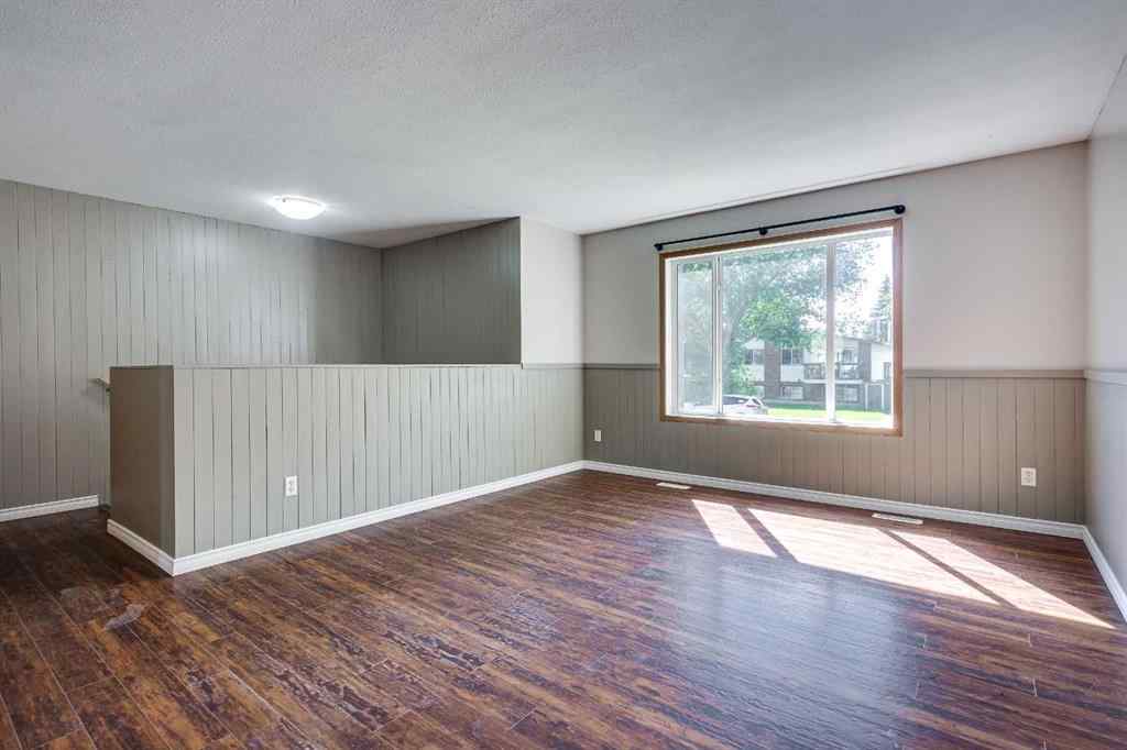 MLS® A2245580 - Unit #A 5915 52 Avenue  in Riverside Meadows Red Deer, Residential
