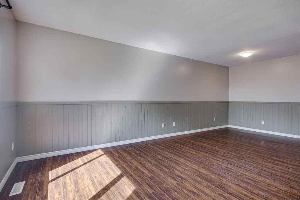 MLS® A2245580 - Unit #A 5915 52 Avenue  in Riverside Meadows Red Deer, Residential