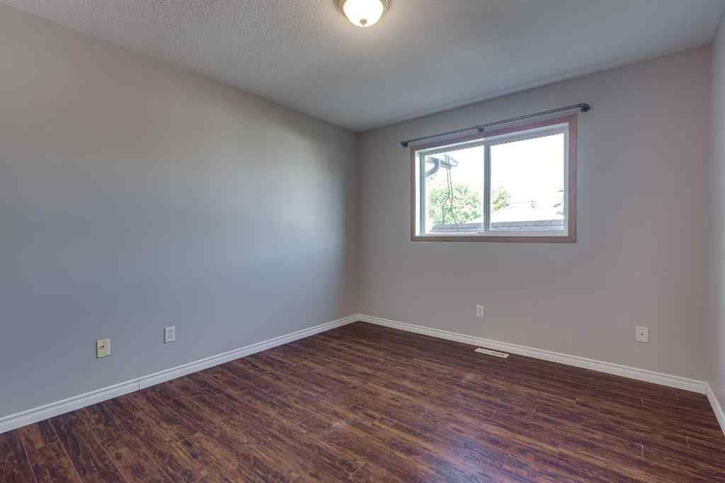 MLS® A2245580 - Unit #A 5915 52 Avenue  in Riverside Meadows Red Deer, Residential
