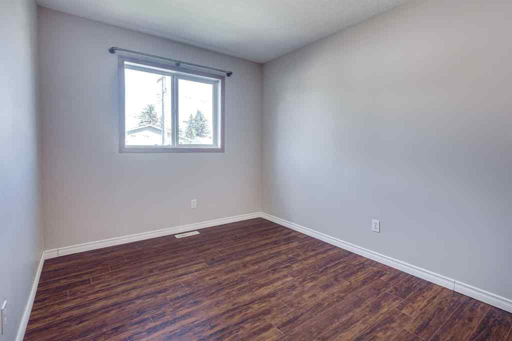 MLS® A2245580 - Unit #A 5915 52 Avenue  in Riverside Meadows Red Deer, Residential