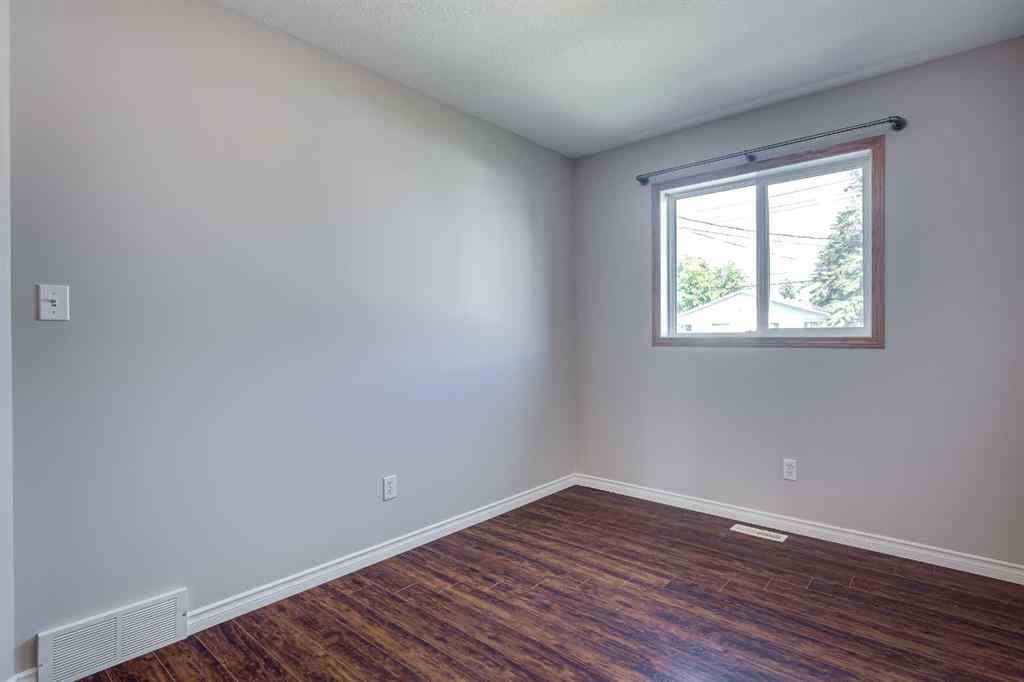 MLS® A2245580 - Unit #A 5915 52 Avenue  in Riverside Meadows Red Deer, Residential