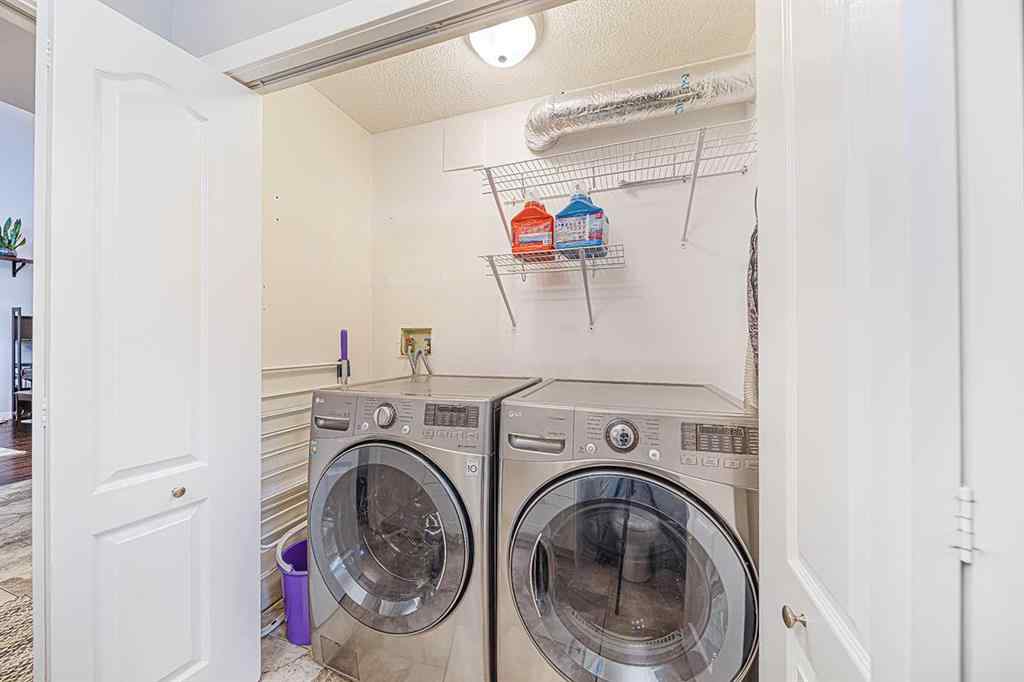 MLS® A2245588 - 104 Hawktree Green NW in Hawkwood Calgary, Residential
