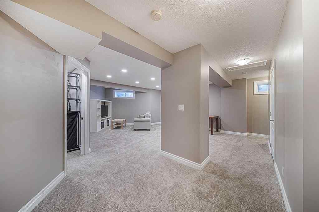 MLS® A2245588 - 104 Hawktree Green NW in Hawkwood Calgary, Residential