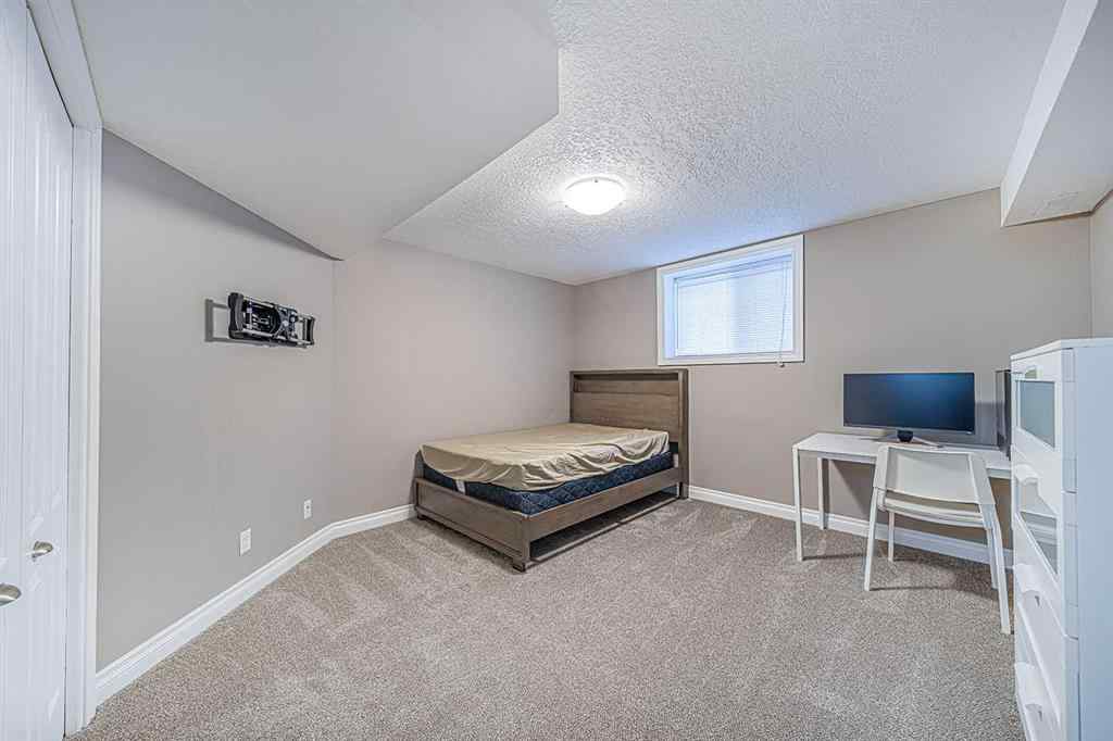 MLS® A2245588 - 104 Hawktree Green NW in Hawkwood Calgary, Residential