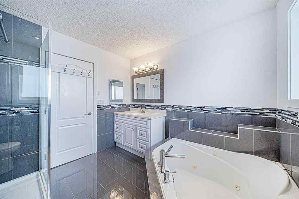 MLS® A2245588 - 104 Hawktree Green NW in Hawkwood Calgary, Residential